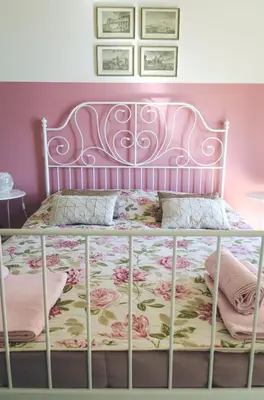 Letto o letti in una camera di Aretè Guest House
