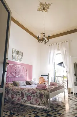 Letto o letti in una camera di Aretè Guest House
