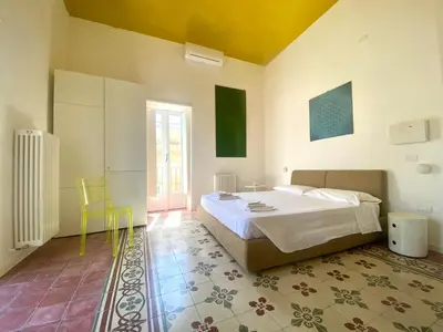 Letto o letti in una camera di KLEOMENE tempio di Apollo