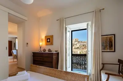 Letto o letti in una camera di Casa Zaffiro