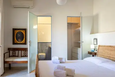 Letto o letti in una camera di Casa Zaffiro