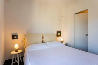 Letto o letti in una camera di Casa Aurora