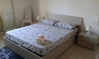 Letto o letti in una camera di casa Carlotta