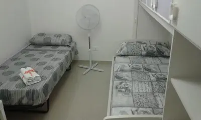 Letto o letti in una camera di casa Carlotta