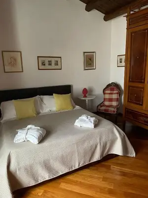 Letto o letti in una camera di Residenza Teseo
