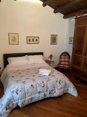 Letto o letti in una camera di Residenza Teseo