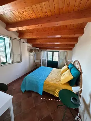 Letto o letti in una camera di CASA GAIA nel Val di Noto