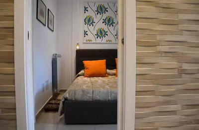 Letto o letti in una camera di Casa Alcalà Deluxe