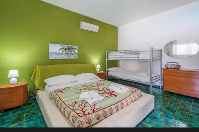 Letto o letti in una camera di B&S Beach villa con piscina