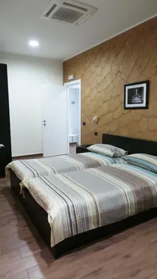 Letto o letti in una camera di Duomo Bed & Breakfast