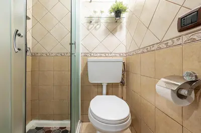 Bagno di GuestHost - Cozy Flat in Catania's Historic Center