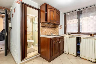 Cucina o angolo cottura di GuestHost - Cozy Flat in Catania's Historic Center