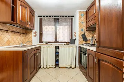 Cucina o angolo cottura di GuestHost - Cozy Flat in Catania's Historic Center