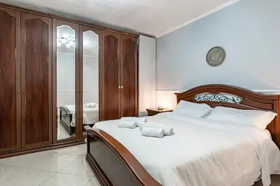 Letto o letti in una camera di GuestHost - Cozy Flat in Catania's Historic Center