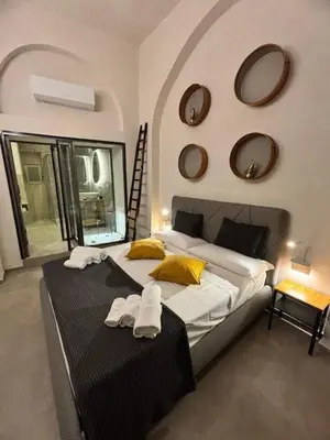 Letto o letti in una camera di Casa del Pastaio