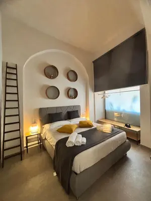 Letto o letti in una camera di Casa del Pastaio
