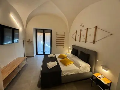 Letto o letti in una camera di Casa del Pastaio