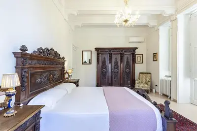 Letto o letti in una camera di Casa Giovanna