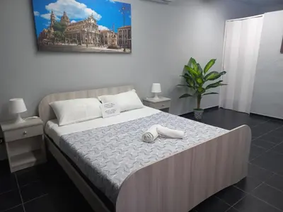 Letto o letti in una camera di Airport Quadrifoglio
