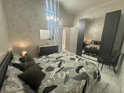 Letto o letti in una camera di Casa Vacanza Dani e Jon