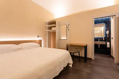 Letto o letti in una camera di ELESOR & Spa