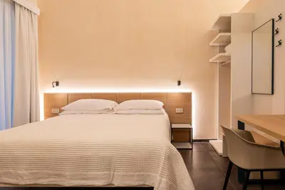 Letto o letti in una camera di ELESOR & Spa
