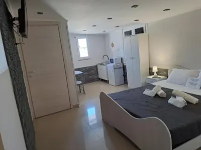 Letto o letti in una camera di Il Quadrifoglio House Airport