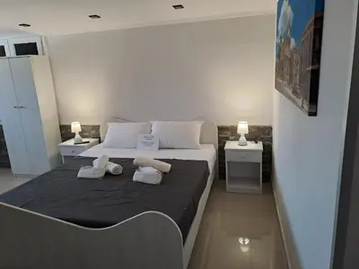 Letto o letti in una camera di Il Quadrifoglio House Airport