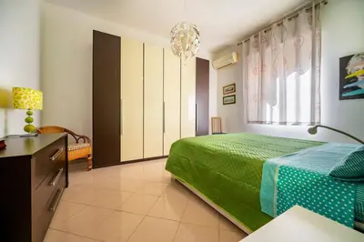Letto o letti in una camera di Casa grazia