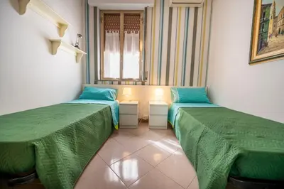 Letto o letti in una camera di Casa grazia