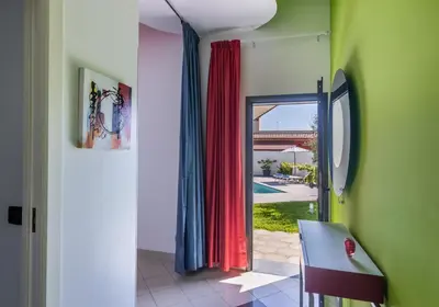 TV o dispositivi per l'intrattenimento presso Villa Teocrito Piscina & Mare