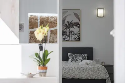 Letto o letti in una camera di Domus Laureti