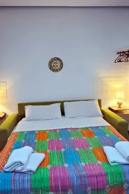 Letto o letti in una camera di Rosa's Home