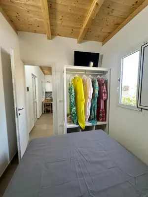Letto o letti in una camera di Anastasia Beach Cottage GIRASOLE