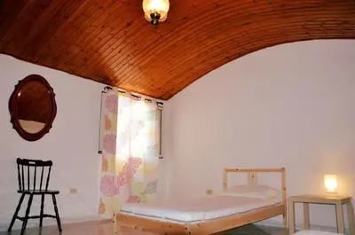 Letto o letti in una camera di Al vicolo