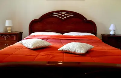 Letto o letti in una camera di Al vicolo