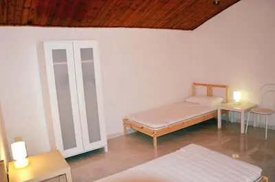 Letto o letti in una camera di Al vicolo
