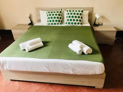 Letto o letti in una camera di Casa GIARU'