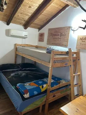 Letto o letti in una camera di Mansarda IGUANA