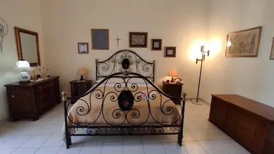 Letto o letti in una camera di Casa dei Nonni