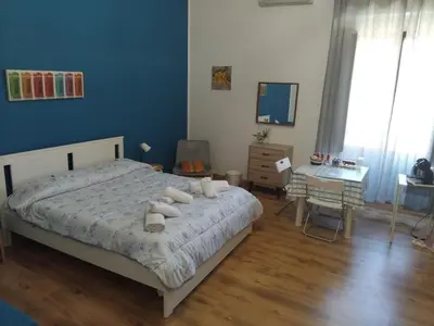 Letto o letti in una camera di A Un PASSO DAL DUOMO