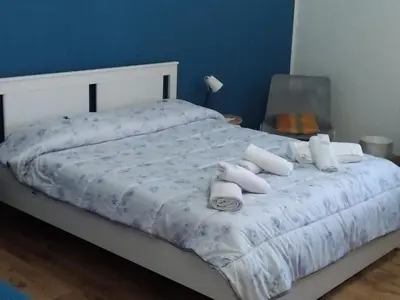 Letto o letti in una camera di A Un PASSO DAL DUOMO