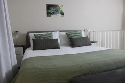 Letto o letti in una camera di Residenza Marconi vicino Ortigia