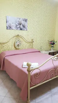 Letto o letti in una camera di Casa Valmary
