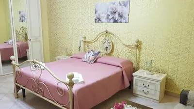 Letto o letti in una camera di Casa Valmary