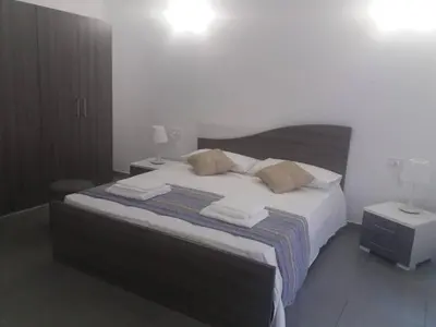 Letto o letti in una camera di Two-story house in the city -climatized - wifi