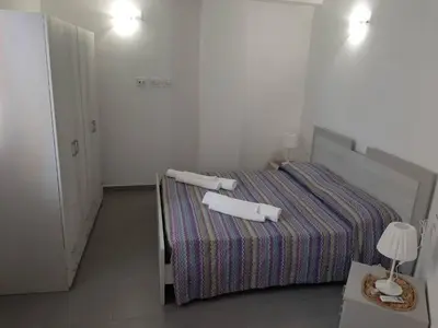 Letto o letti in una camera di Two-story house in the city -climatized - wifi
