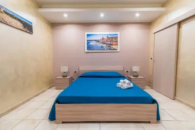 Letto o letti in una camera di Appartamento La Trinacria