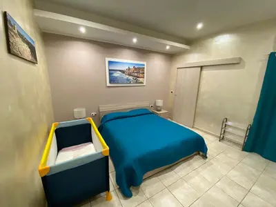Letto o letti in una camera di Appartamento La Trinacria