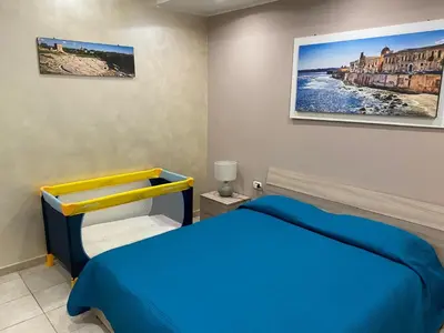 Letto o letti in una camera di Appartamento La Trinacria
